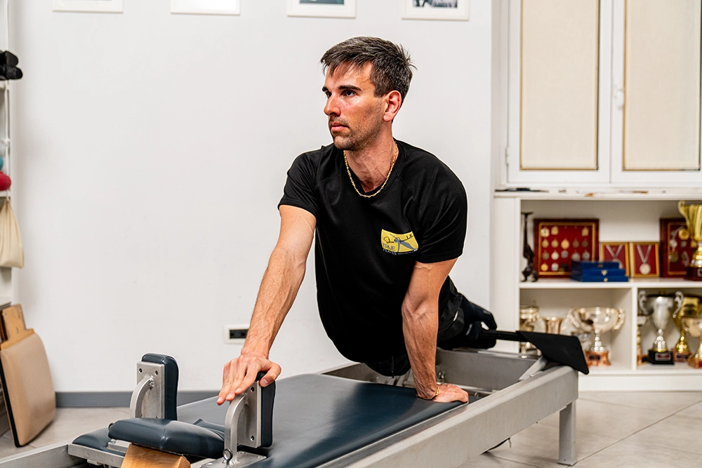 Lavoro sugli attrezzi classici del metodo True Pilates